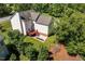 Aerial view of a backyard with a playground and a patio at 318 Riggsbee Farm Dr, Cary, NC 27519
