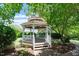 Charming community gazebo nestled among mature trees and landscaped gardens at 318 Riggsbee Farm Dr, Cary, NC 27519