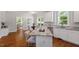 Spacious kitchen with granite countertops, stainless steel appliances, and a cozy breakfast nook for casual dining at 318 Riggsbee Farm Dr, Cary, NC 27519