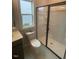 Bathroom with a glass-enclosed shower and updated fixtures at 3509 Bailey Lake Dr, Fuquay Varina, NC 27526
