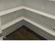 Walk-in pantry with custom shelving offers ample storage space at 3509 Bailey Lake Dr, Fuquay Varina, NC 27526