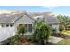 Landscaped backyard showcasing a combination of trees and manicured shrubbery and a small concrete patio at 3782 Loblolly Dr # 5, Rocky Mount, NC 27804
