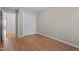 Comfortable bedroom featuring wood floor, closet and neutral-tone paint at 3782 Loblolly Dr # 5, Rocky Mount, NC 27804