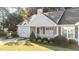 Well-maintained single-story home featuring an attached garage and a beautifully landscaped front yard at 3782 Loblolly Dr # 5, Rocky Mount, NC 27804