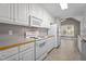 A bright kitchen, equipped with modern white appliances and natural wood countertops at 3782 Loblolly Dr # 5, Rocky Mount, NC 27804