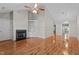 Open living space with hardwood floors, fireplace, built-ins, connecting to the kitchen at 3782 Loblolly Dr # 5, Rocky Mount, NC 27804