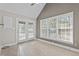 Bright sunroom featuring large windows and french doors, offering ample natural light at 3782 Loblolly Dr # 5, Rocky Mount, NC 27804
