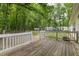 Rear deck is the perfect spot for outdoor relaxation and entertaining at 40 Raccoon Xing, Henderson, NC 27537