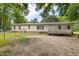 View of the back exterior and large lot at 40 Raccoon Xing, Henderson, NC 27537