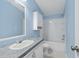 Cozy bathroom with sink, vanity, toilet, and shower/tub combo at 40 Raccoon Xing, Henderson, NC 27537