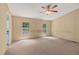 Spacious bedroom featuring two windows and a ceiling fan at 40 Raccoon Xing, Henderson, NC 27537