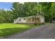 Beautiful single Gathering home with covered front porch and classic colors at 40 Raccoon Xing, Henderson, NC 27537