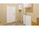 Functional laundry area with washer/dryer hookups and storage at 40 Raccoon Xing, Henderson, NC 27537