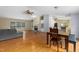 Spacious living room featuring laminate flooring, a fireplace, and abundant natural light at 40 Raccoon Xing, Henderson, NC 27537