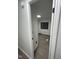 View of a bedroom with laminate flooring and paneled walls at 4025 Royal Dr, Franklinton, NC 27525