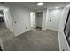 Bedroom with closet and gray wood flooring, offering a clean and bright space at 4025 Royal Dr, Franklinton, NC 27525