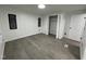 Spacious bedroom with gray flooring, a closet, and two windows that let in lots of light at 4025 Royal Dr, Franklinton, NC 27525