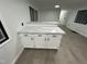 Dining area includes white cabinets with white and grey countertop at 4025 Royal Dr, Franklinton, NC 27525