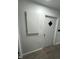 Interior door with a diamond-shaped window with white trim and hardware at 4025 Royal Dr, Franklinton, NC 27525
