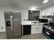 Modern kitchen featuring stainless steel appliances and marble-look countertops at 4025 Royal Dr, Franklinton, NC 27525