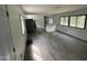 A wide shot of the living room showing the kitchen and dining area at 4025 Royal Dr, Franklinton, NC 27525