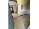 Entry to a room in need of renovations, showing its layout and potential at 410 Carmil Dr, Selma, NC 27576