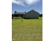 The rear of the property includes a carport and satellite dish at 410 Carmil Dr, Selma, NC 27576