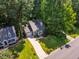 Charming single-Gathering home with a long driveway and mature trees in a lush neighborhood at 4117 Olde Coach Rd, Durham, NC 27707