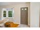 Cozy living room showcases a large window for ample natural light at 4117 Olde Coach Rd, Durham, NC 27707