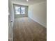 Cozy bedroom with plush carpeting and natural light, perfect for relaxation at 412 La Maison Ave # 5, Wendell, NC 27591