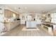 Charming kitchen with a mix of painted and stainless steel finishes, featuring an island and cozy decor at 4345 Mcintyre Rd, Gibsonville, NC 27249