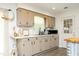 Cozy kitchen featuring updated cabinets, stainless steel appliances, and ample counter space for meal preparation and serving at 4345 Mcintyre Rd, Gibsonville, NC 27249