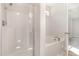 Bathroom featuring a separate shower and soaking tub, complemented by modern fixtures at 454 Martins Mill Ct, Wendell, NC 27591