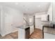 Kitchen featuring a center island, stainless steel appliances, granite countertops, and white cabinets at 454 Martins Mill Ct, Wendell, NC 27591