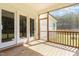 Enjoy the outdoors from this screened porch, with access to backyard and beautiful wood flooring at 454 Martins Mill Ct, Wendell, NC 27591