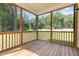 Relaxing screened porch surrounded by nature views, perfect for enjoying quiet mornings or evenings at 454 Martins Mill Ct, Wendell, NC 27591