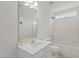 Bathroom featuring a large mirror, white sink, white vanity, and shower at 4716 Miller Dr, Durham, NC 27704