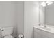 Bathroom with toilet and sink at 4716 Miller Dr, Durham, NC 27704