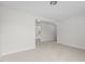 Bright bonus room featuring neutral carpet and connecting spaces at 4716 Miller Dr, Durham, NC 27704