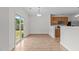 Charming dining area with sliding glass doors leading to the backyard and convenient access to kitchen at 4716 Miller Dr, Durham, NC 27704