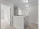 Hallway featuring neutral carpeting and white trim details at 4716 Miller Dr, Durham, NC 27704