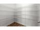 Spacious walk-in pantry with ample shelving, providing plenty of storage for all your kitchen needs at 4716 Miller Dr, Durham, NC 27704