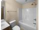 Bright bathroom with single vanity and tub shower at 495 Ruth Cir, Fuquay Varina, NC 27526