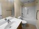 Bathroom featuring single vanity, toilet, and shower/tub combo with grab bars at 495 Ruth Cir, Fuquay Varina, NC 27526