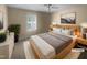 Cozy bedroom with a large bed, soft lighting, and modern decor at 495 Ruth Cir, Fuquay Varina, NC 27526