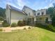 Charming two-story home with solar panels and a covered front porch at 495 Ruth Cir, Fuquay Varina, NC 27526