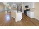 Open concept kitchen with stainless steel appliances and a kitchen island at 495 Ruth Cir, Fuquay Varina, NC 27526