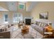 Bright and airy living room featuring a fireplace and neutral-toned furniture at 495 Ruth Cir, Fuquay Varina, NC 27526
