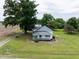 A charming home situated on a vast lot surrounded by lush greenery at 5004 Us 70 Alt, Princeton, NC 27569