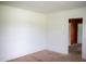 Bright bedroom with neutral carpet and white walls awaiting personal touches at 5004 Us 70 Alt, Princeton, NC 27569